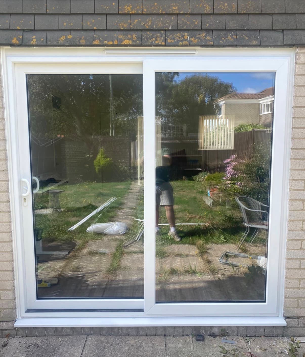 White sliding patio doors installed by GreenSave